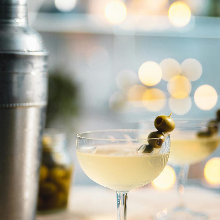 A photo of a martini glass and shaker