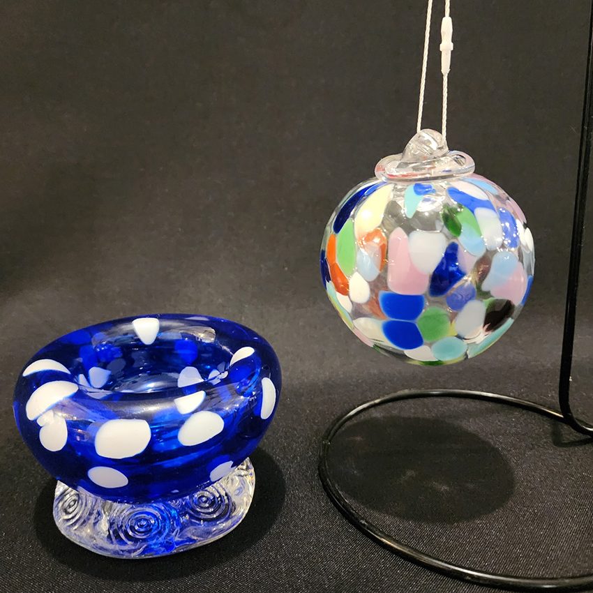 a blown glass bubble bowl and ornament