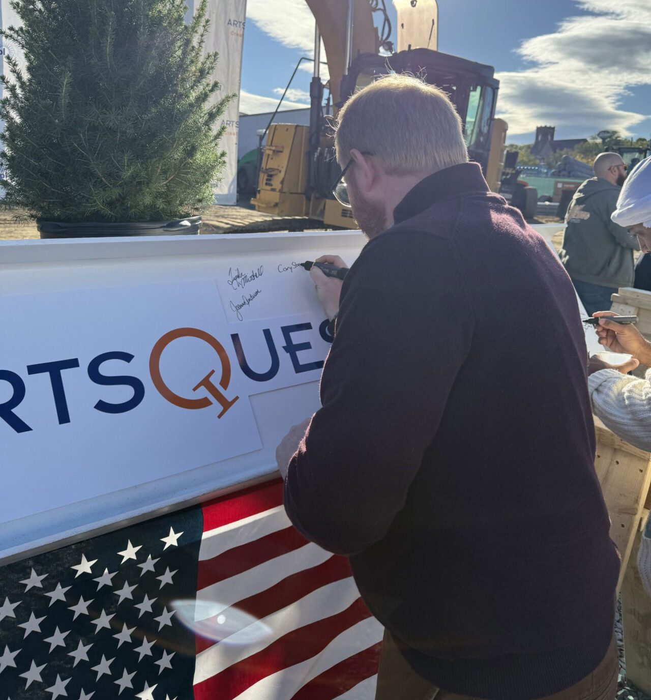 volunteer-beam-signing-CoreySigning