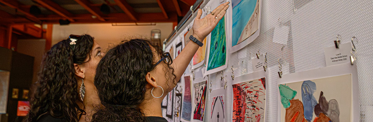 People viewing an ArtSmart exhibition